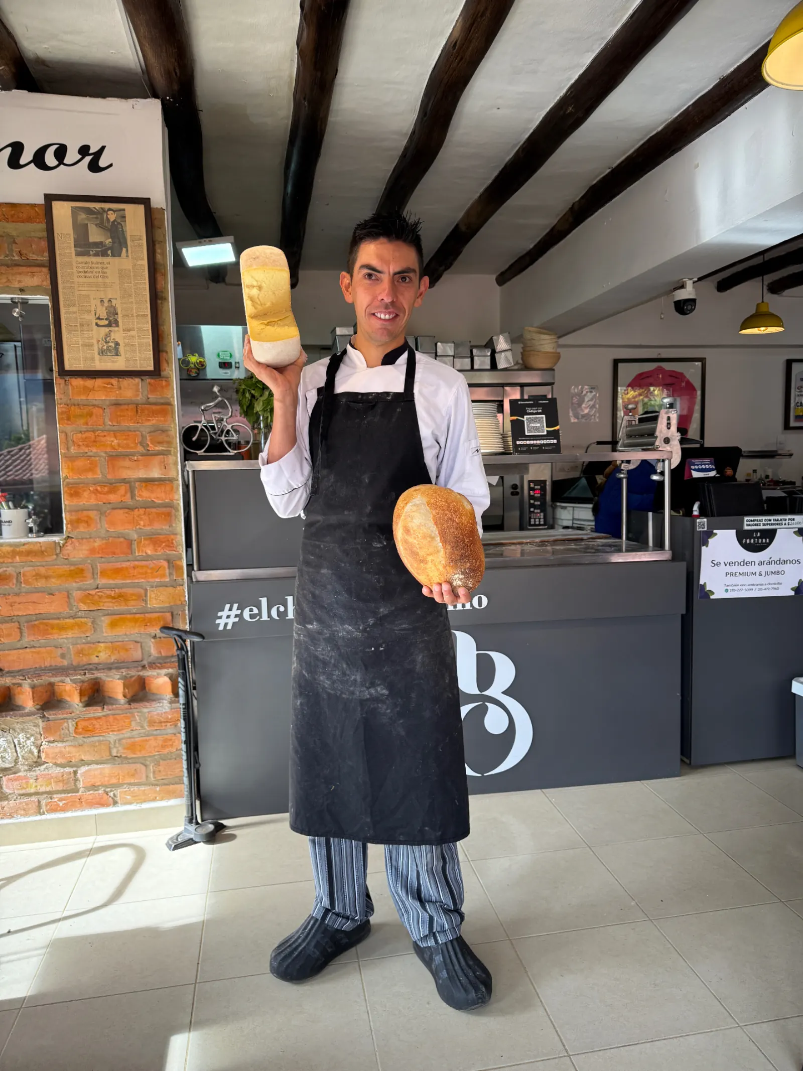 Camilo with Gregoria sourdough loaves